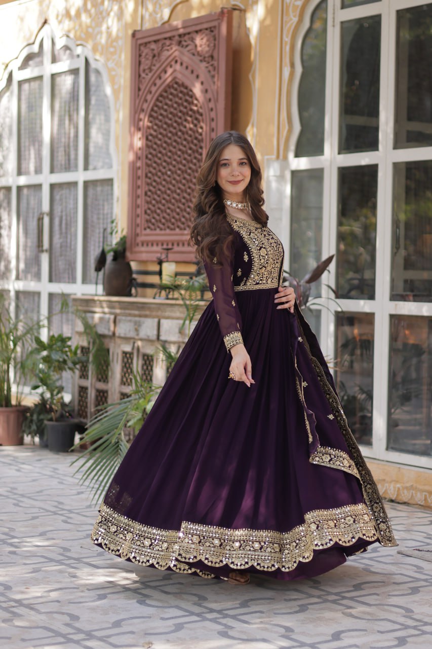 Women's Luxurious Plum Velvet Anarkali Gown with Heavy Gold Zari & Sequin Embroidery – Perfect for Weddings & Grand Festivities